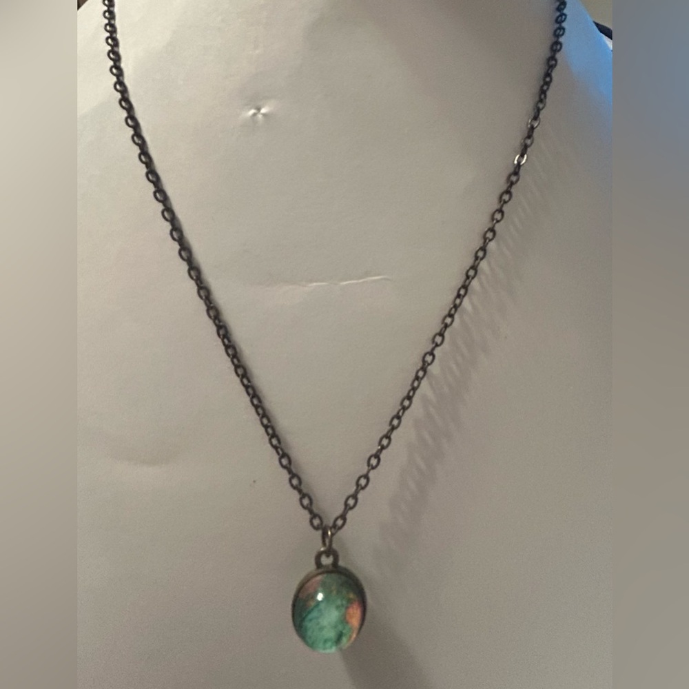 Elegant Plunder Globe Pendant Necklace
